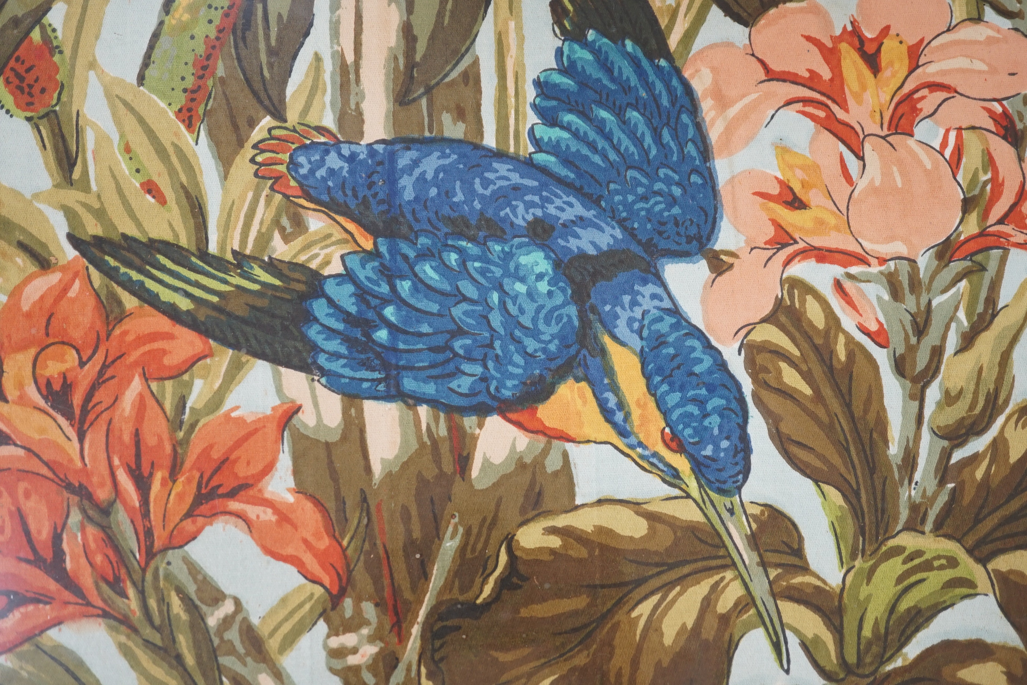 A large rare tortoiseshell picture frame and exotic panel of printed fabric, 70 cms wide x 52 cms high including frame